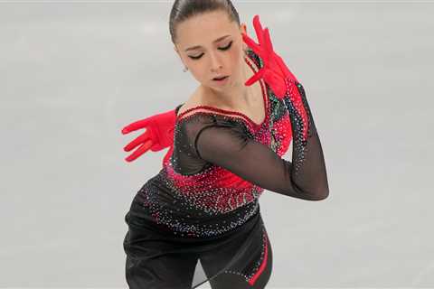 Russia wins gold in team figure skating as Kamila Valieva hits two quad jumps.