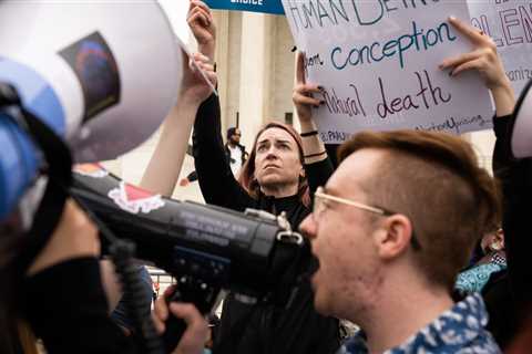 Demonstrators Gathered at Supreme Court Lament, and Celebrate, Leaked Draft