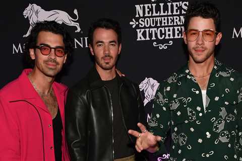 Joe, Kevin and Nick Jonas celebrate the grand opening of the new family restaurant in Las Vegas!