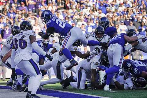 Giants rally from 10 down, top Ravens 24-20 on Barkley’s run