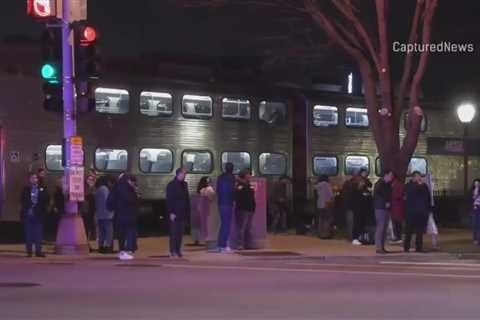 Person hurt after Metra train hits car in Arlington Heights