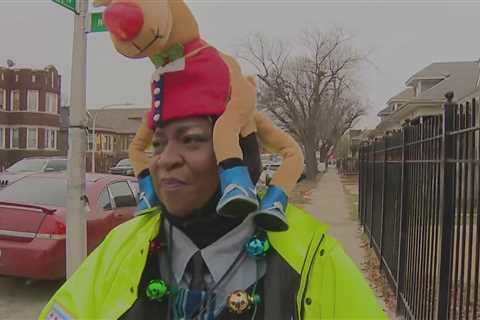 Crossing guard providing safety and holiday spirit in Chicago Lawn