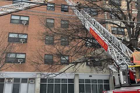 Person dangling from window rescued from West End high-rise fire