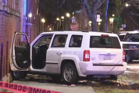 SUV hits tree, building after driver and teen passenger shot in Woodlawn