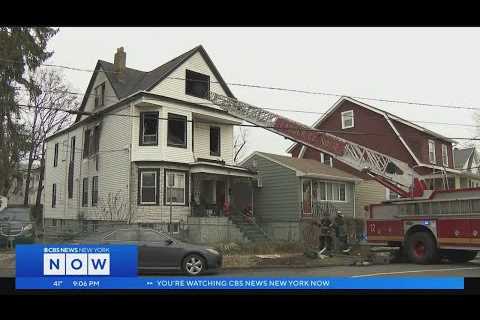 4 hurt, including child and firefighter, after house fire in Newark