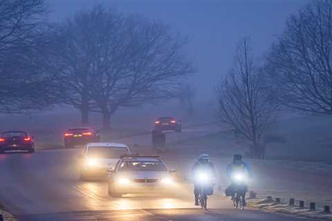 UK weather: Commuters facing travel delays and flight cancellations as warnings issued over floods..