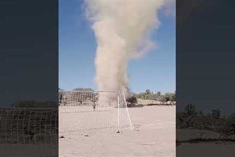 Footballers stunned as dust devil sweeps across pitch in Mexico