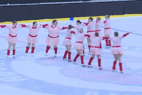 Local synchronized skating team honors Rockford Peaches during routine