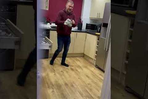 Husband caught passionately singing Whitney Houston while doing dishes