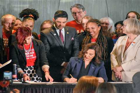 At Michigan State University, Whitmer signs first gun reform bills ⋆