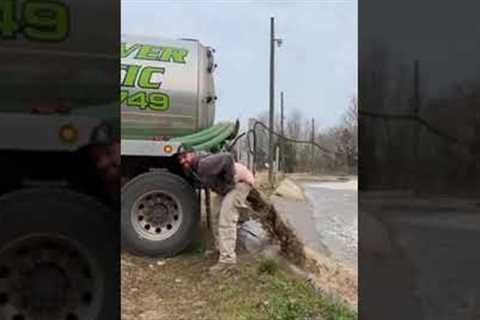 Waste workers have fun with sludge-filled dump