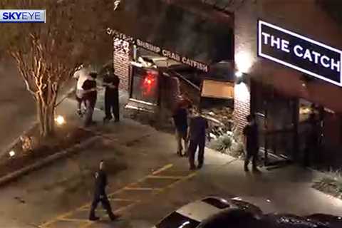 Car crashes building: Video shows aftermath of vehicle slamming into The Catch restaurant in..