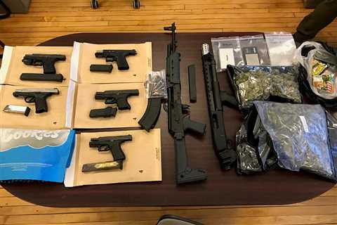 Rockford Man Arrested with 7 Firearms and Nearly 1000g of Weed