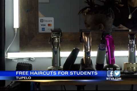 VIDEO: Local barbershop donates free haircuts to children for back to school