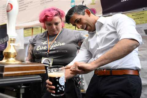 Rishi Sunak heckled for alcohol tax hikes as he pulls pint at London beer festival