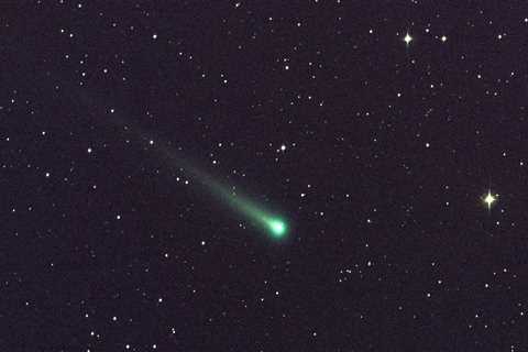 A mysterious green comet is approaching Earth and could be visible to the naked eye soon. Here's..