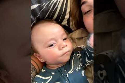 Baby boy gives fierce stare to camera