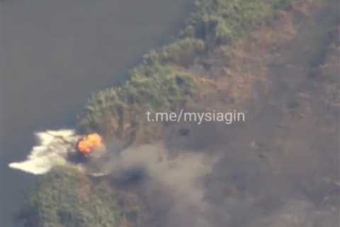 Video appears to show a Russian tank hitting a mine and running out of control before sinking into..