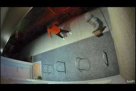 Security camera footage of DA Williams and mother carjacked by armed suspects