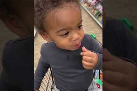 Toddler tries Warheads candy for the first time