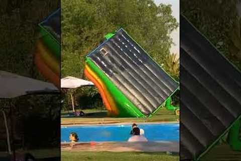 Man Overturns Inflatable Slide