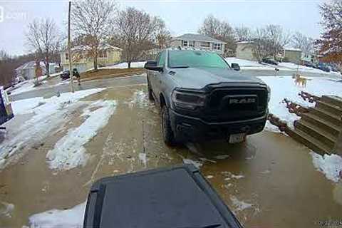 Man Slides Down Driveway and Into Street