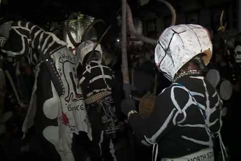 Skull & Bone gang walks up Treme with their chants and drum beats