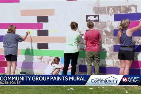 Local artists paint mural at Jackson library