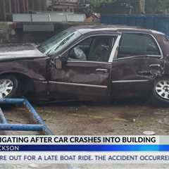 Jackson police investigate after car crashes into building