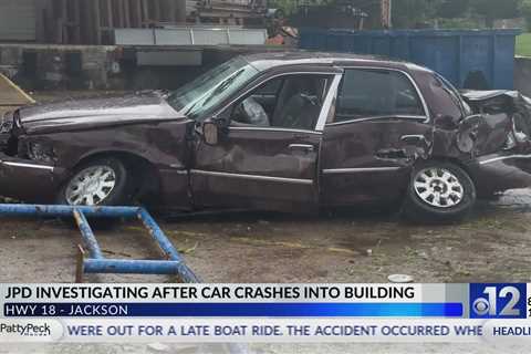 Jackson police investigate after car crashes into building