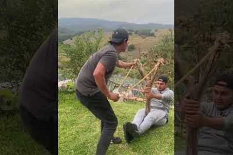 Giant Slingshot Sends Man Flying Backward