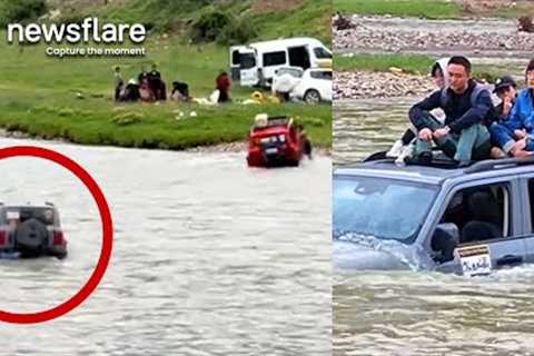 Family Stranded In River In Crossing Attempt || Newsflare