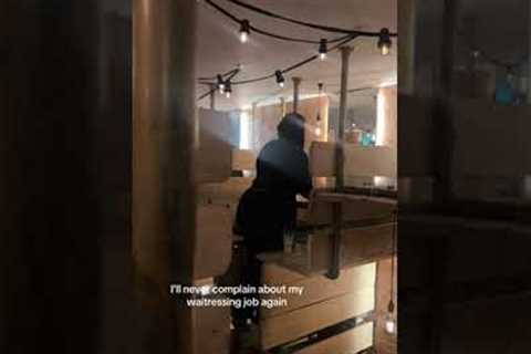 Servers Use Ladders In London Restaurant