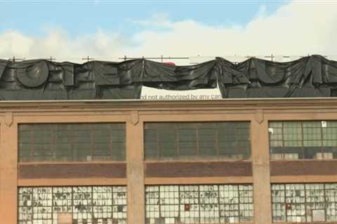 Controversial “Vote for Trump” sign lights Amsterdam skyline